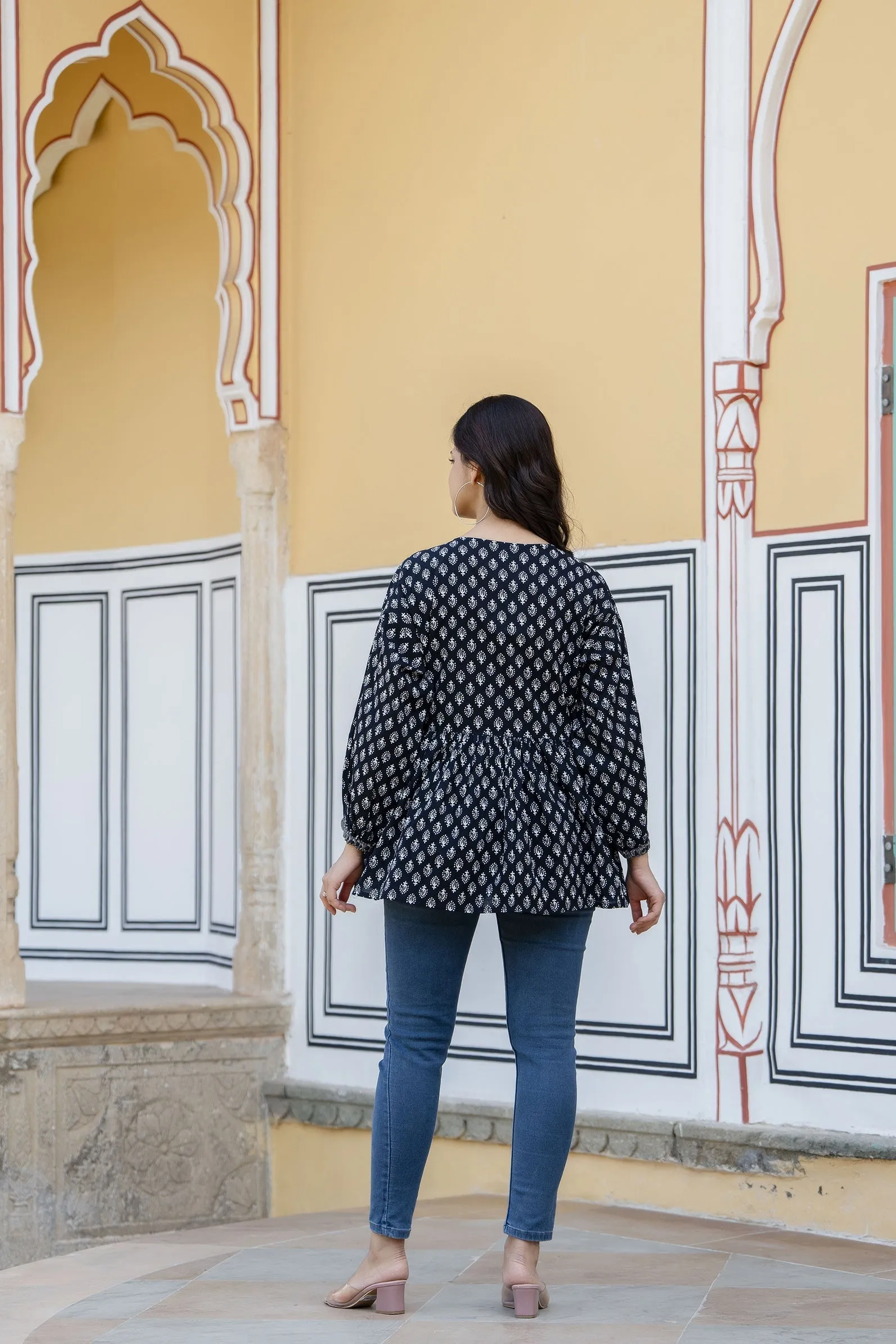 Women Black Printed V-Neck Peplum Tunic