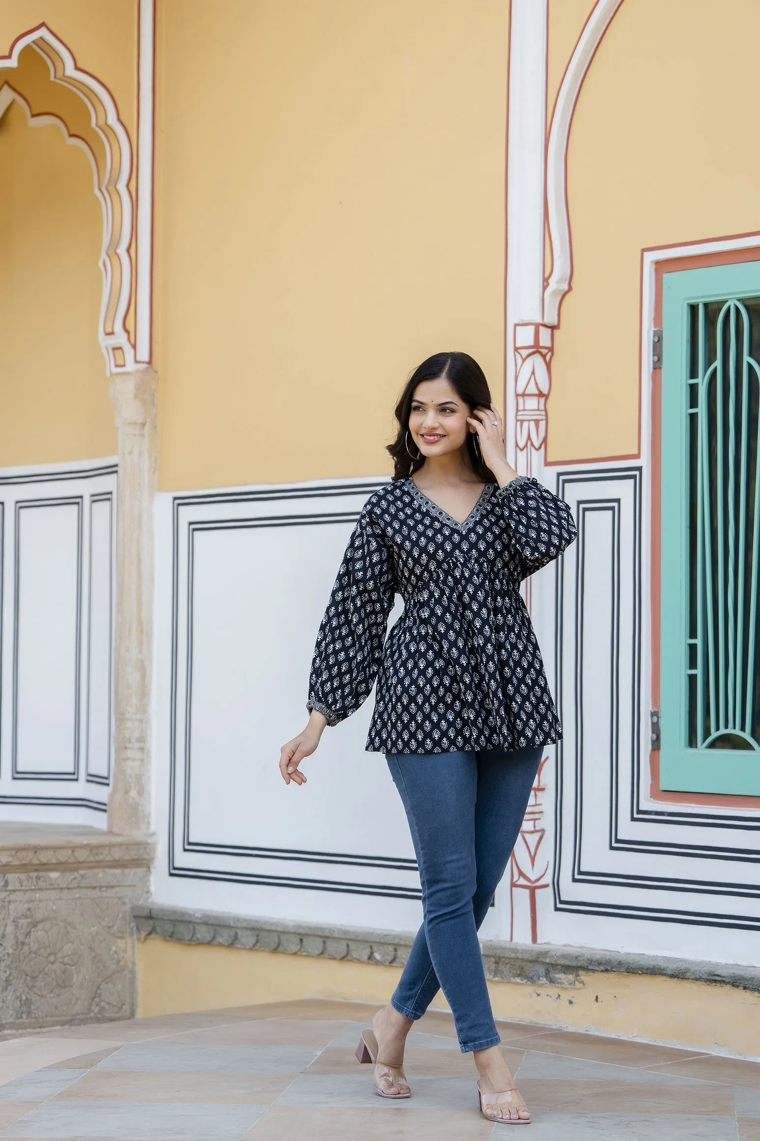 Women Black Printed V-Neck Peplum Tunic