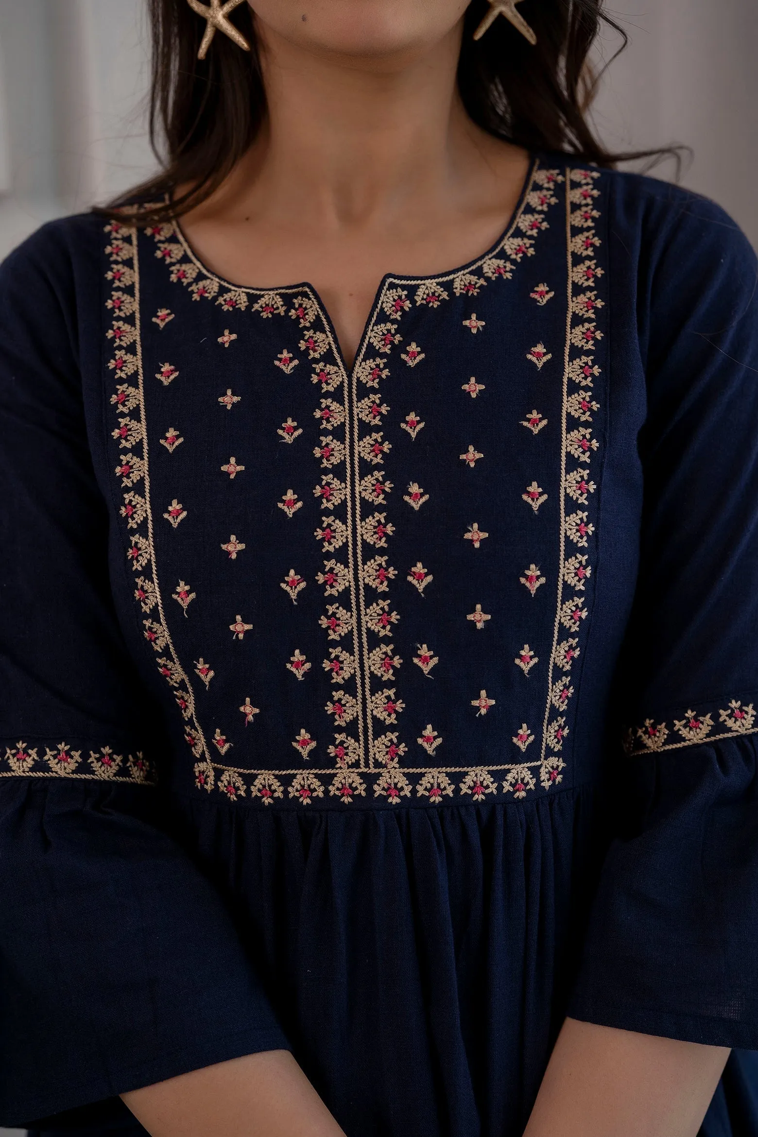 Women Navy Blue Embroidered Peplum Tunic